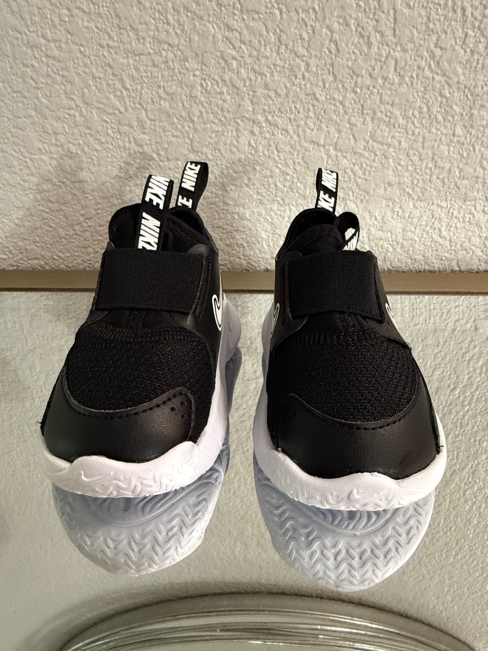 Nike Black and White Slip-On Baby Sneakers